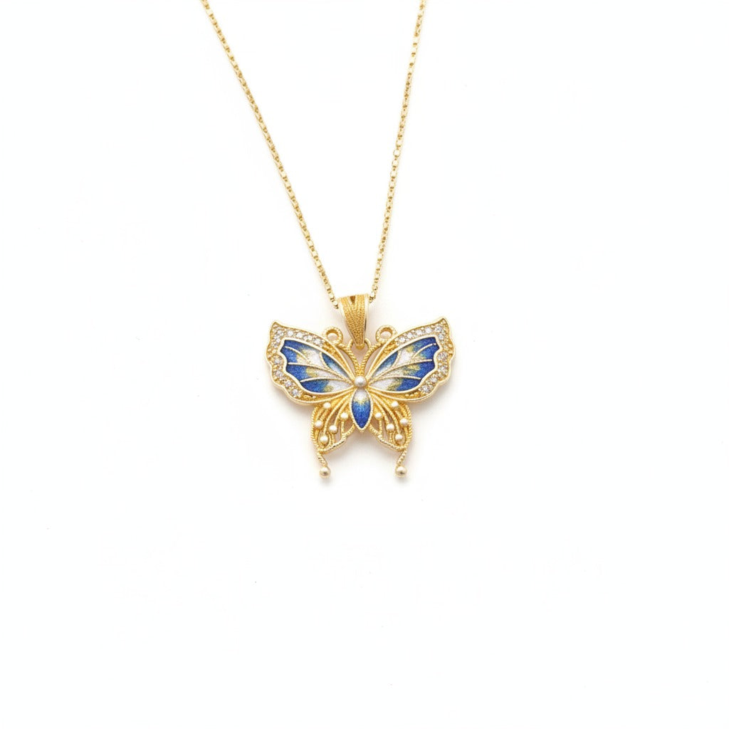 Butterfly pendant combining hollow silverwork and colorful enamel — a graceful Chinese enamel jewelry piece symbolizing transformation.
