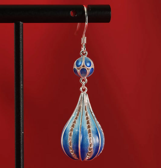 Deep blue enamel droplet earrings reflecting calm ocean tones — handmade enamel silver earrings ideal for poetic and elegant styles.
