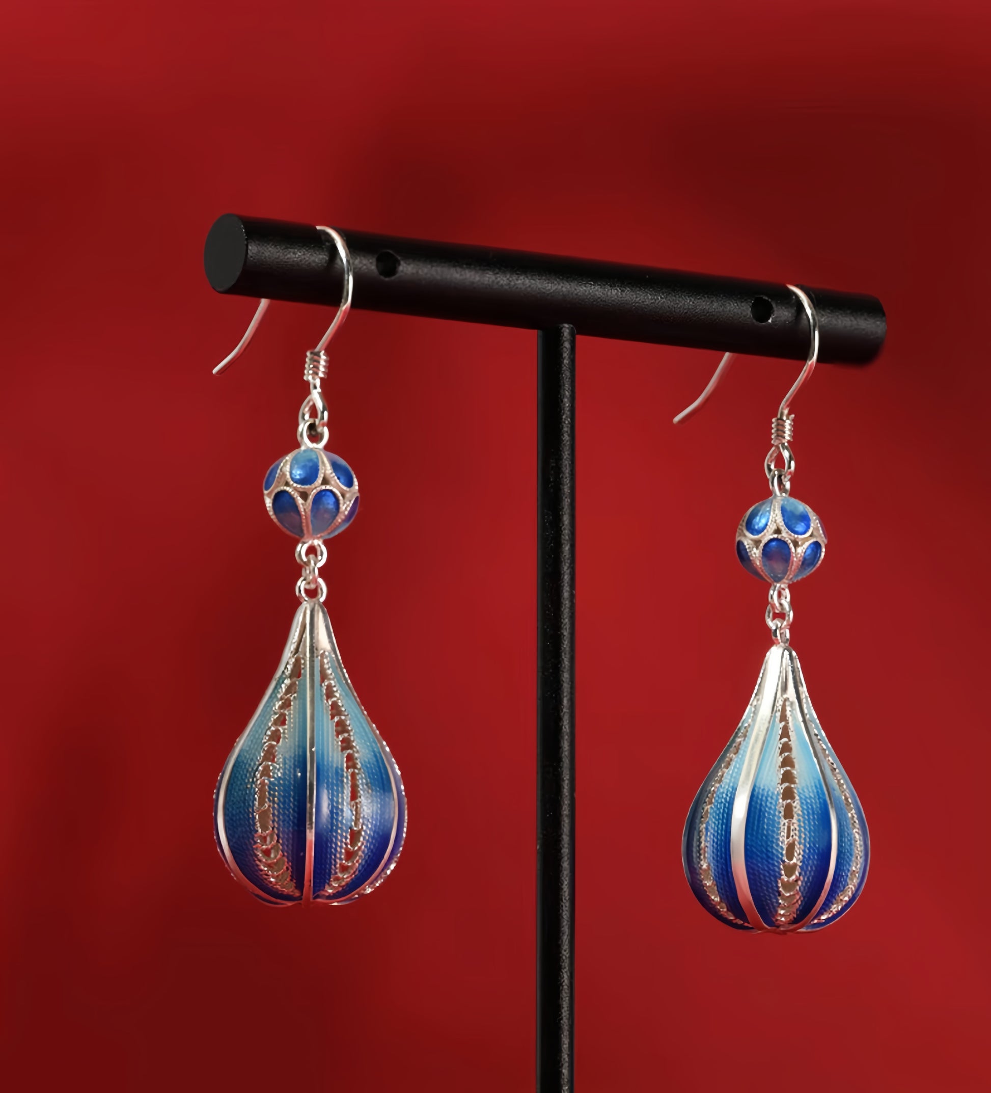 Deep blue enamel droplet earrings reflecting calm ocean tones — handmade enamel silver earrings ideal for poetic and elegant styles.
