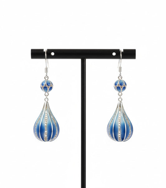Deep blue enamel droplet earrings reflecting calm ocean tones — handmade enamel silver earrings ideal for poetic and elegant styles.
