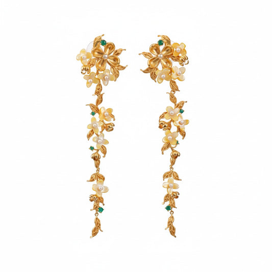 Handmade silver earrings with osmanthus filigree inlay and elegant tassels, traditional handmade silver jewelry ideal for festive wear or gifting.