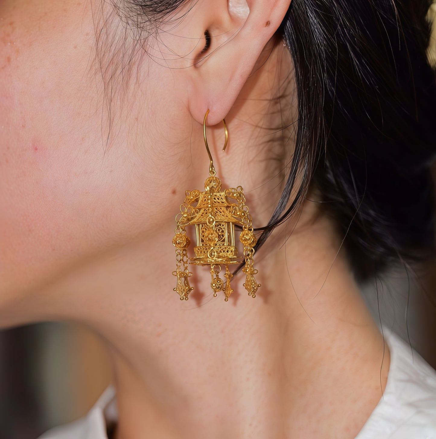 Handmade silver earrings with lantern-inspired filigree motif — symbolizing warmth and reunion, perfect for festive occasions and gifting.
