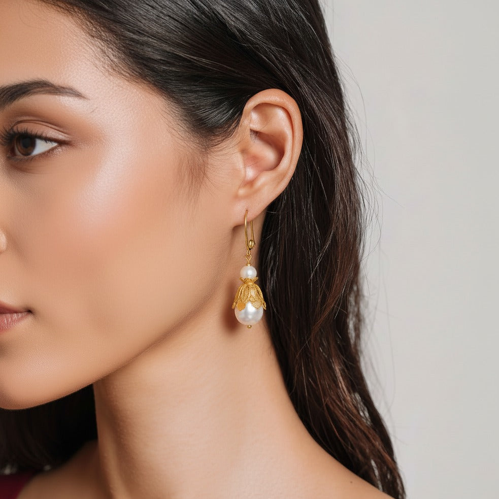 Handmade silver earrings featuring natural pearls set in delicate filigree — lightweight and elegant, perfect for everyday wear or gifting.
