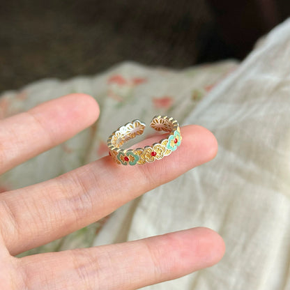 Sterling silver enamel ring inspired by delicate petals — combines enamel artistry with fine handmade silver craftsmanship, ideal with enamel earrings.
