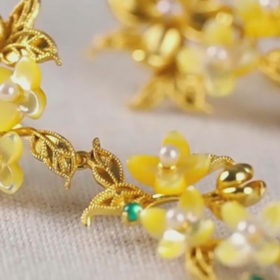 Handmade silver earrings with osmanthus filigree inlay and elegant tassels, traditional handmade silver jewelry ideal for festive wear or gifting.mp4