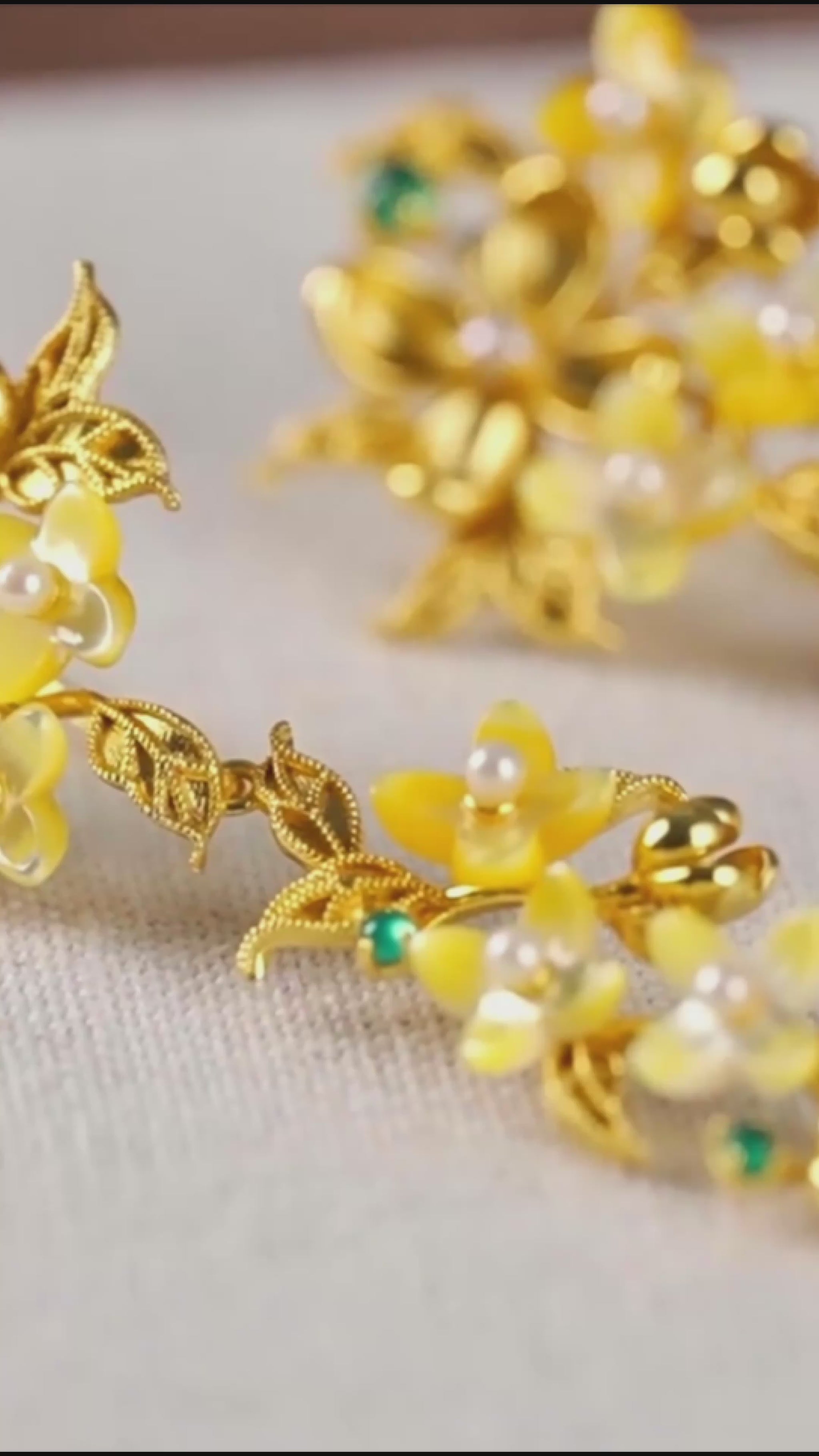 Handmade silver earrings with osmanthus filigree inlay and elegant tassels, traditional handmade silver jewelry ideal for festive wear or gifting.mp4