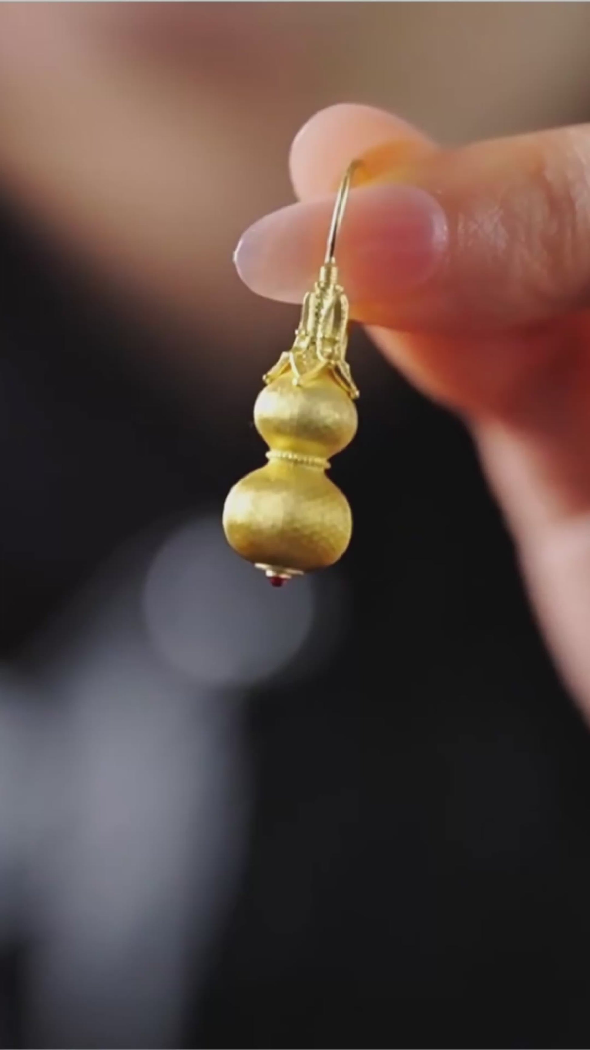 Gold-plated sterling silver gourd stud earrings with filigree-style texture
