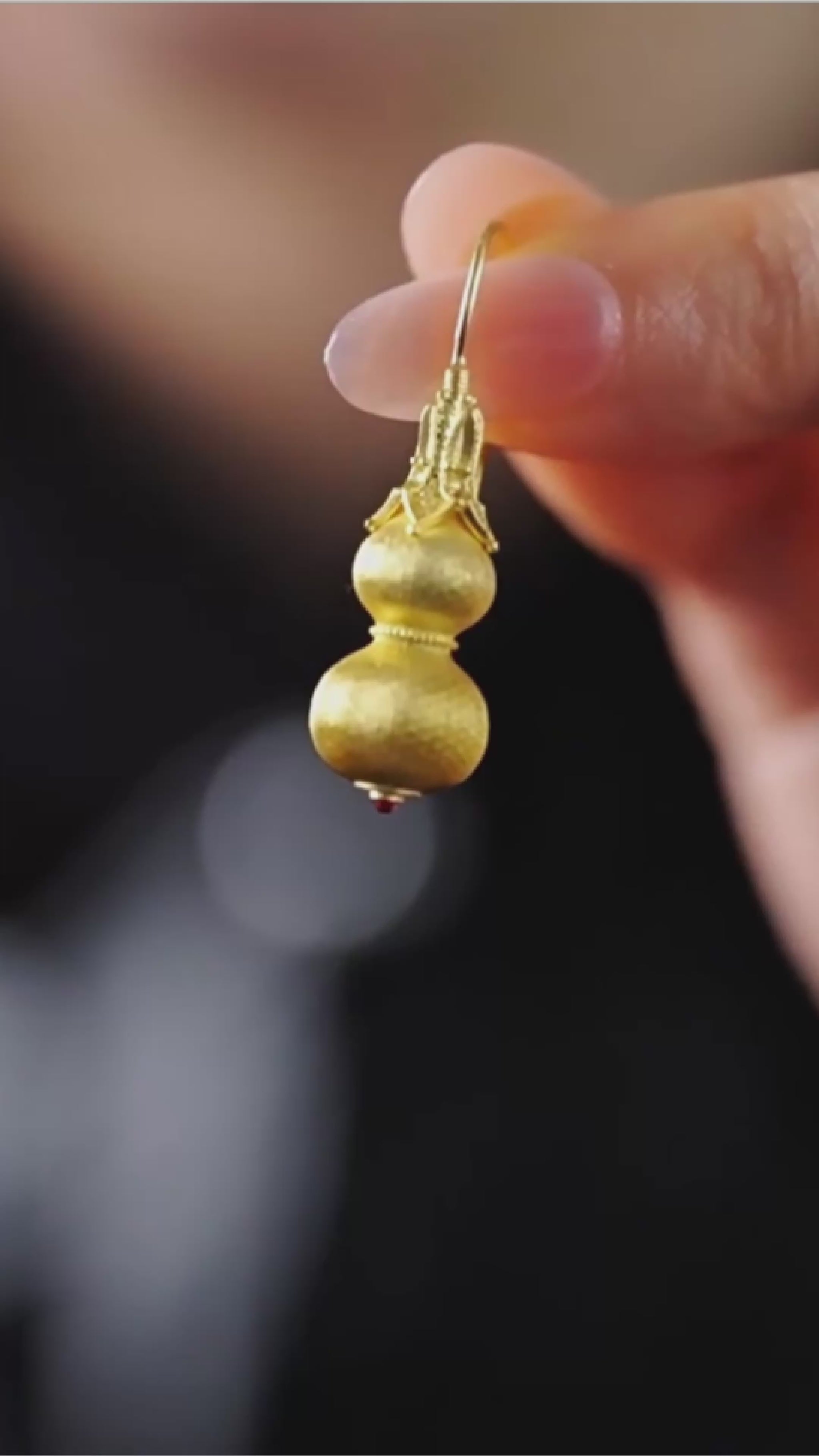 Gold-plated sterling silver gourd stud earrings with filigree-style texture
