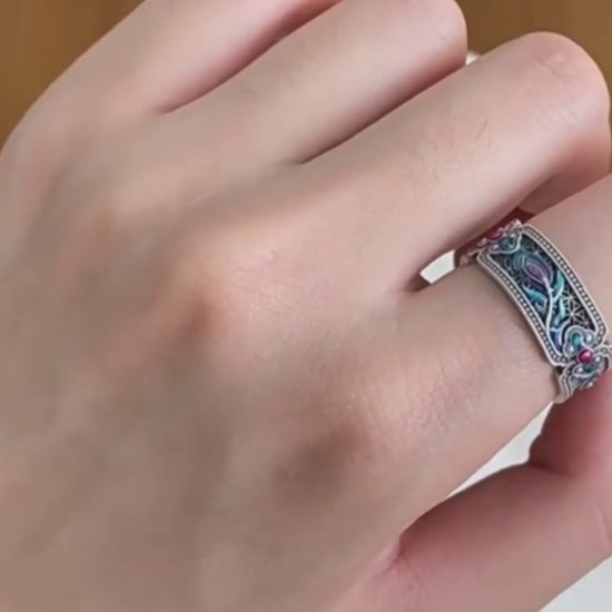Blue and green peacock enamel ring with oxidized silver and adjustable band
